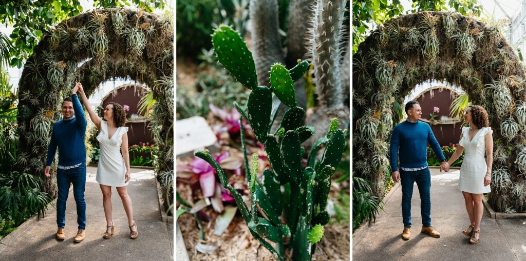 couple twirling on a pathway in the greenhouse of the Daniel Stowe Botanical Garden