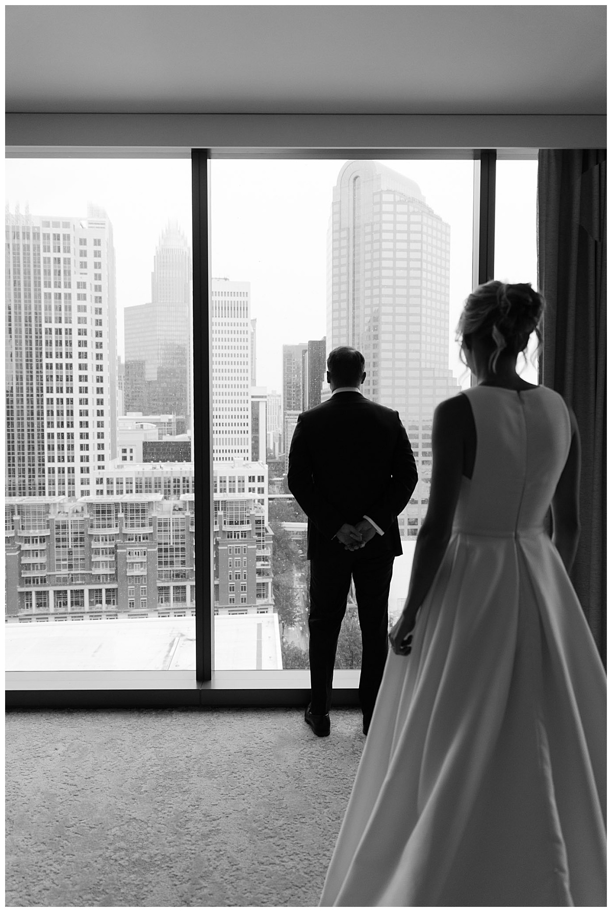 bride stands behind groom just before first look by The Hazel Club